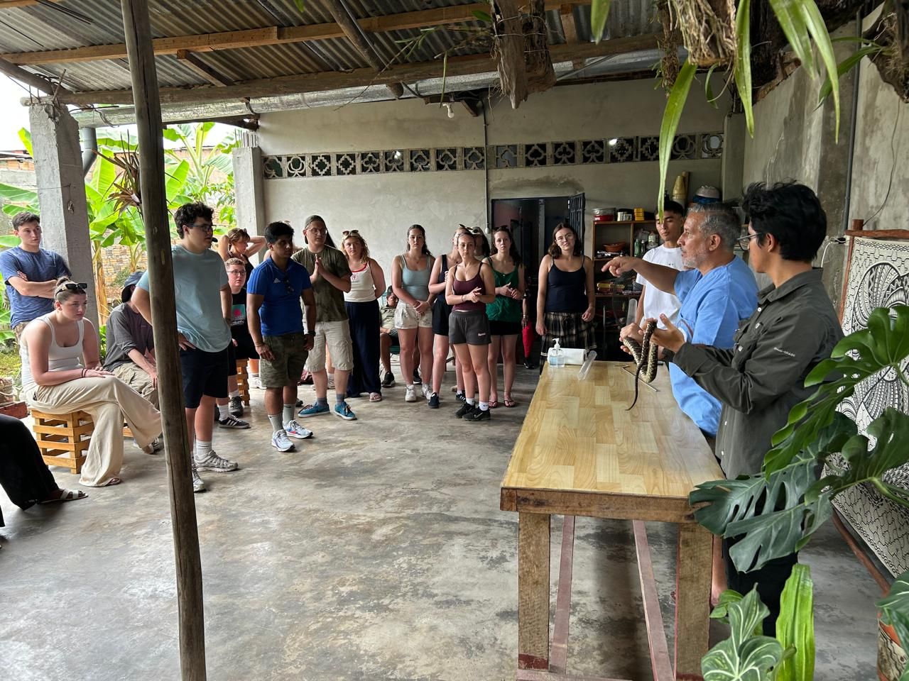 A visiting group gathered for a presentation at the facility.